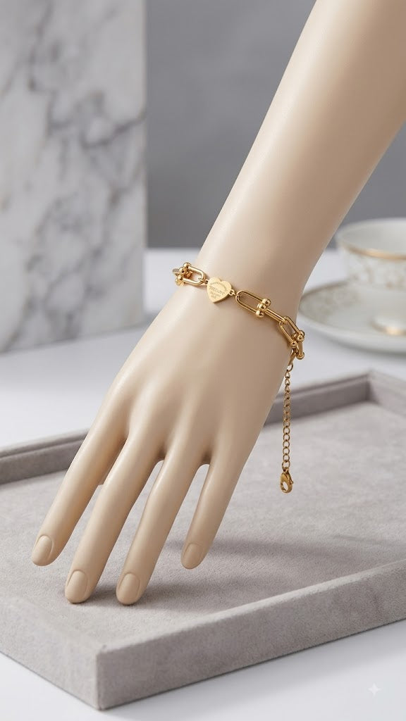 سلسلة ستانل تيل ذهبي بقلب ذهبي