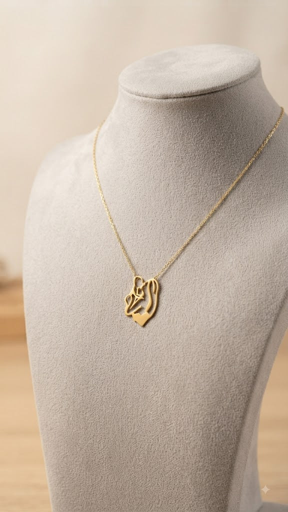 سلسلة ستانليس تيل ذهبي بقطعة ذهبية